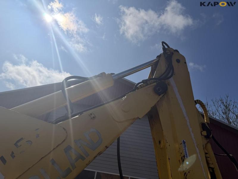 New Holland LB115B-4PS backhoe loader 21