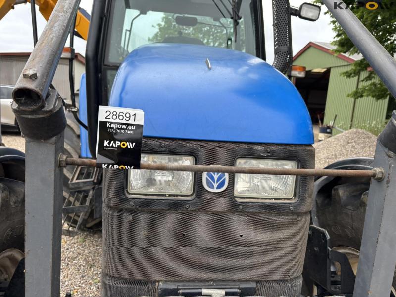 New Holland TS 115 with Bomford arm mower 12