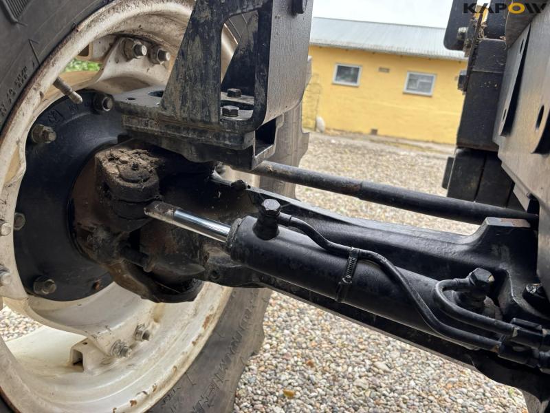 New Holland TS 115 with Bomford arm mower 40