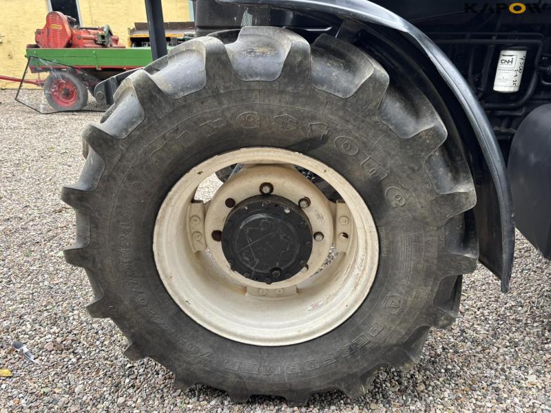 New Holland TS 115 with Bomford arm mower 41