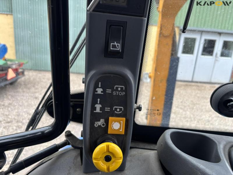 New Holland TS 115 with Bomford arm mower 46
