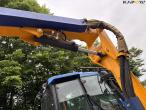 New Holland TS 115 with Bomford arm mower 77