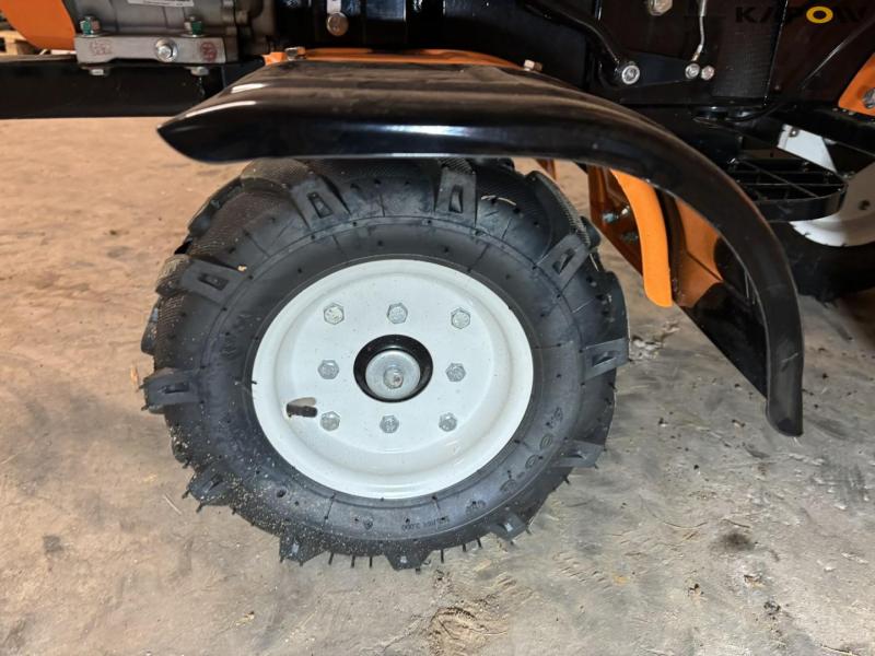 Tool carrier with tiller 35